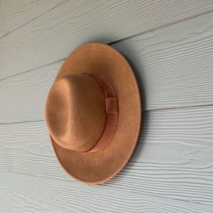 Burt orange World Market hat.